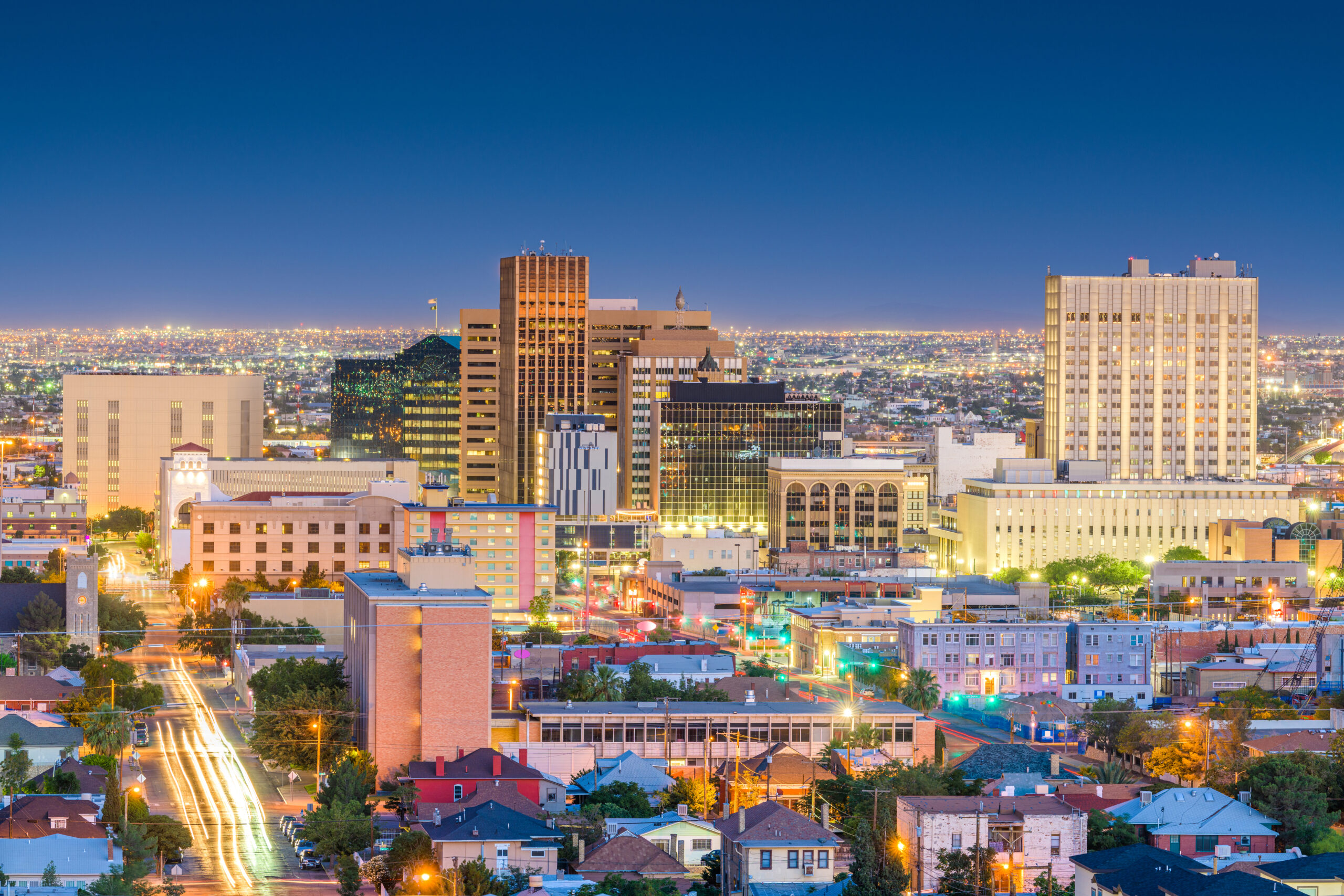 El Paso, Texas, USA  downtown city skyline at dusk with Juarez, Mexico in the distance.